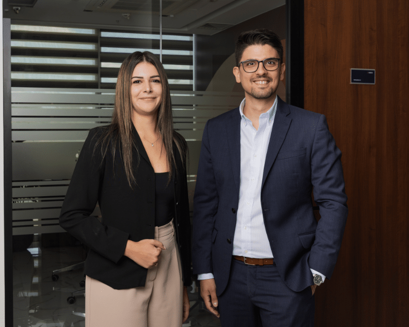 A2CO's Accounts Department posing for a photo in the board room, including Partner Clinton Cutajar and Cliona Testa Refalo.