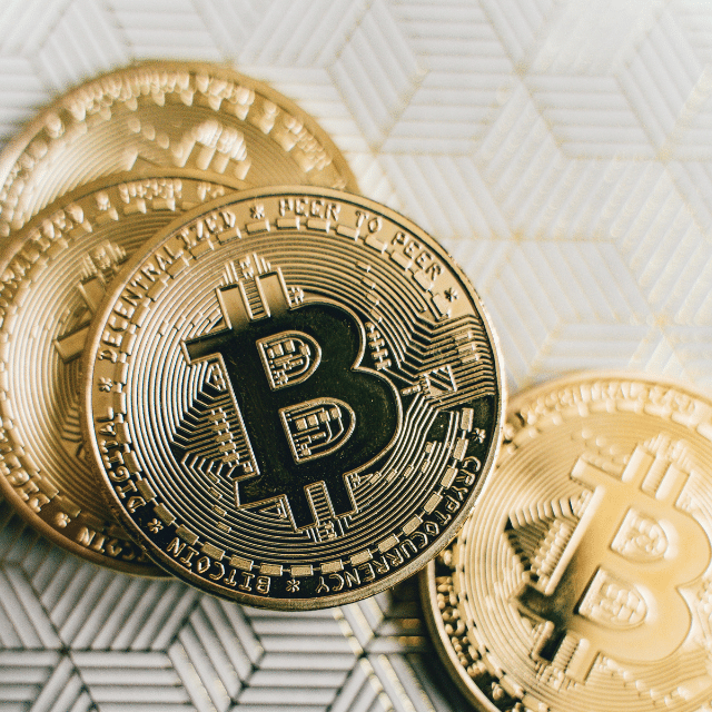 Bitcoin coin placed on a white and black background